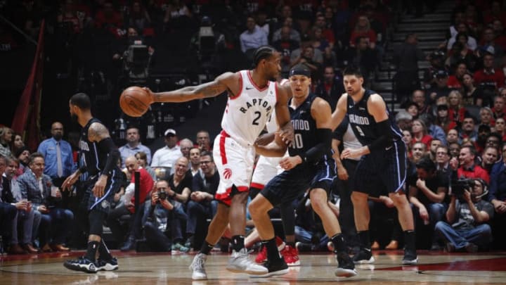 TORONTO, CANADA - APRIL 16: Kawhi Leonard #2 of the Toronto Raptors handles the ball against the Orlando Magic during Game Two of Round One of the 2019 NBA Playoffs on April 16, 2019 at the Scotiabank Arena in Toronto, Ontario, Canada. NOTE TO USER: User expressly acknowledges and agrees that, by downloading and or using this Photograph, user is consenting to the terms and conditions of the Getty Images License Agreement. Mandatory Copyright Notice: Copyright 2019 NBAE (Photo by Mark Blinch/NBAE via Getty Images)