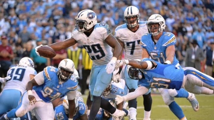 Nov 6, 2016; San Diego, CA, USA; Tennessee Titans running back DeMarco Murray (29) carries the ball to score a touchdown as San Diego Chargers cornerback Adrian Phillips (31) defends during the second half at Qualcomm Stadium. San Diego won 43-35. Mandatory Credit: Orlando Ramirez-USA TODAY Sports