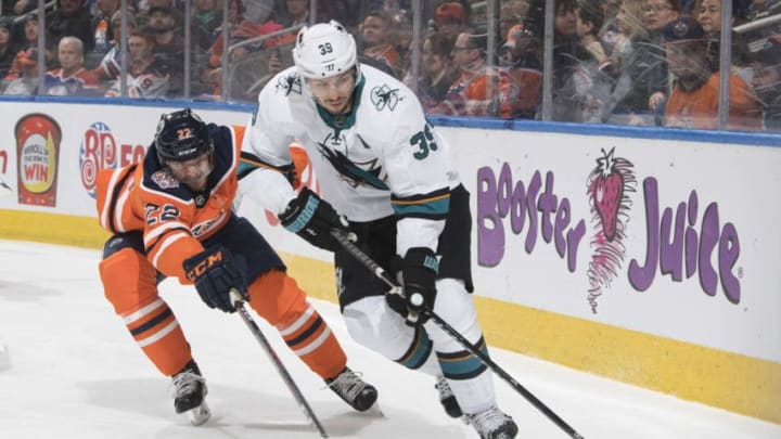 EDMONTON, AB - FEBRUARY 9: Tobias Rieder #22 of the Edmonton Oilers pursues Logan Couture #39 of the San Jose Sharks on February 9, 2019 at Rogers Place in Edmonton, Alberta, Canada. (Photo by Andy Devlin/NHLI via Getty Images)