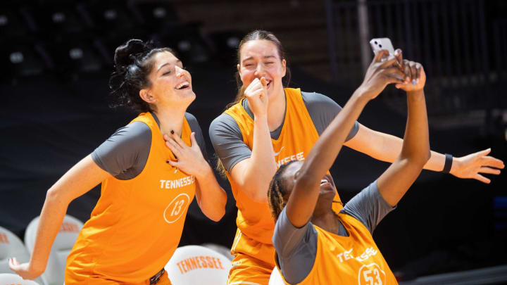 Tennessee guard/forward Justine Pissott (13), Tennessee guard/forward Marta Suarez (33) and Tennessee forward Jillian Hollingshead (53) sing and dance for a social media video during the Lady Vols’ media day at Thompson-Boling Arena on the University of Tennessee campus in Knoxville on Wednesday, Oct. 26, 2022.Kns Lady Vols Media Day Bp