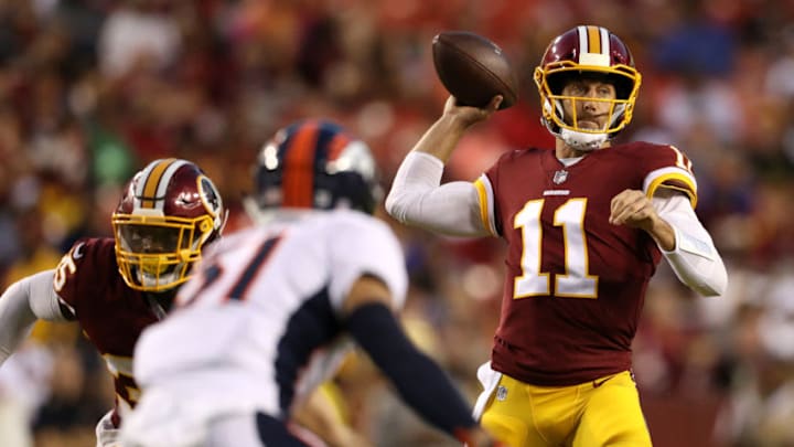 LANDOVER, MD - AUGUST 24: Quarterback Alex Smith #11 of the Washington Redskins looks to pass against the Denver Broncos in the first half during a preseason game at FedExField on August 24, 2018 in Landover, Maryland. (Photo by Patrick Smith/Getty Images)
