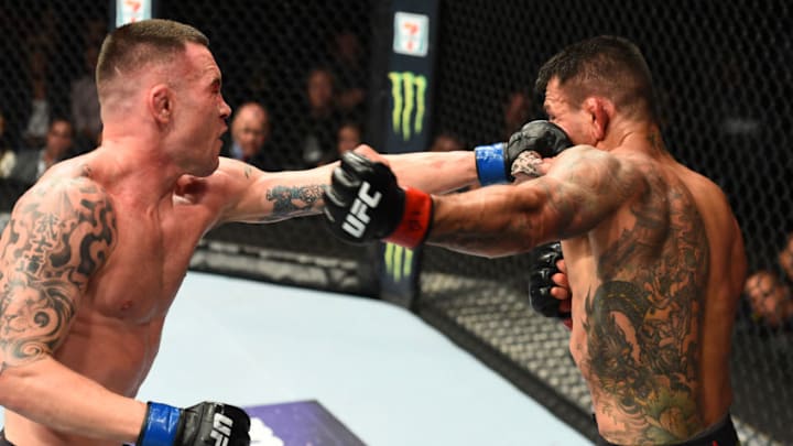 CHICAGO, ILLINOIS - JUNE 09: (L-R) Colby Covington punches Rafael Dos Anjos of Brazil in their interim welterweight title fight during the UFC 225 event at the United Center on June 9, 2018 in Chicago, Illinois. (Photo by Josh Hedges/Zuffa LLC/Zuffa LLC via Getty Images)