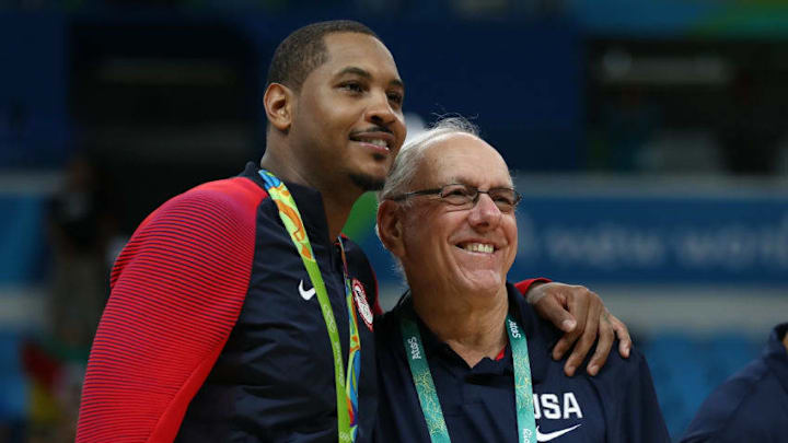 RIO DE JANEIRO, BRAZIL - AUGUST 21: Carmelo Anthony #15 of the United States poses with Team USA assistant coach Jim Boeheim after defeating Serbia in the Men's Gold medal game on Day 16 of the Rio 2016 Olympic Games at Carioca Arena 1 on August 21, 2016 in Rio de Janeiro, Brazil. (Photo by Elsa/Getty Images)