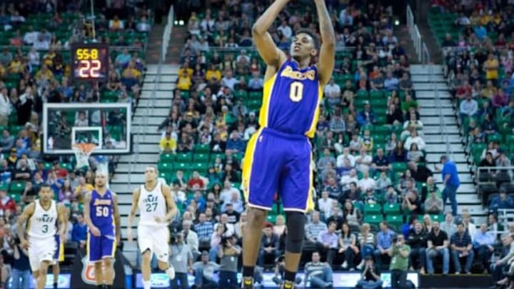 Apr 14, 2014; Salt Lake City, UT, USA; Los Angeles Lakers forward Nick Young (0) shoots during the second half against the Utah Jazz at EnergySolutions Arena. The Lakers won 119-104. Mandatory Credit: Russ Isabella-USA TODAY Sports Apr 14, 2014; Salt Lake City, UT, USA; Los Angeles Lakers forward Nick Young (0) shoots during the second half against the Utah Jazz at EnergySolutions Arena. The Lakers won 119-104. Mandatory Credit: Russ Isabella-USA TODAY Sports