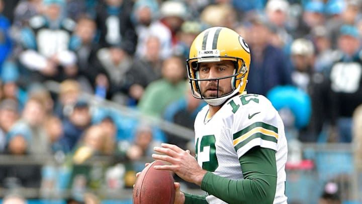 CHARLOTTE, NC – DECEMBER 17: Aaron Rodgers #12 of the Green Bay Packers drops back to pass against the Carolina Panthers during their game at Bank of America Stadium on December 17, 2017 in Charlotte, North Carolina. (Photo by Grant Halverson/Getty Images)