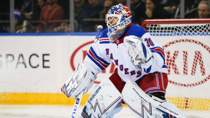 NEW YORK, NY - FEBRUARY 08: New York Rangers Goalie Henrik Lundqvist (30) pays tribute to 1994 Stanley Cup Champion Rangers Goalie Mike Richter by wearing a replica of Richter's mask during the National Hockey League game between the Carolina Hurricanes and the New York Rangers on February 8, 2019 at Madison Square Garden in New York, NY. (Photo by Joshua Sarner/Icon Sportswire via Getty Images)