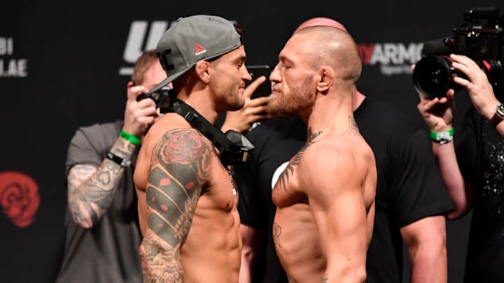 ABU DHABI, UNITED ARAB EMIRATES - JANUARY 22: (L-R) Opponents Dustin Poirier and Conor McGregor of Ireland face off during the UFC 257 weigh-in at Etihad Arena on UFC Fight Island on January 22, 2021 in Abu Dhabi, United Arab Emirates. (Photo by Jeff Bottari/Zuffa LLC)