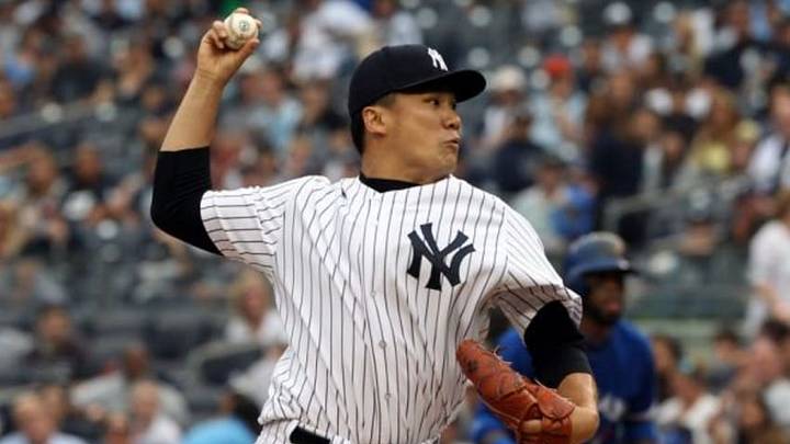 Sep 21, 2014; Bronx, NY, USA; New York Yankees starting pitcher Masahiro Tanaka (19) deliverers a pitch against Yankee Stadium. Mandatory Credit: Noah K. Murray-USA TODAY Sports Sep 21, 2014; Bronx, NY, USA; New York Yankees starting pitcher Masahiro Tanaka (19) deliverers a pitch against Yankee Stadium. Mandatory Credit: Noah K. Murray-USA TODAY Sports
