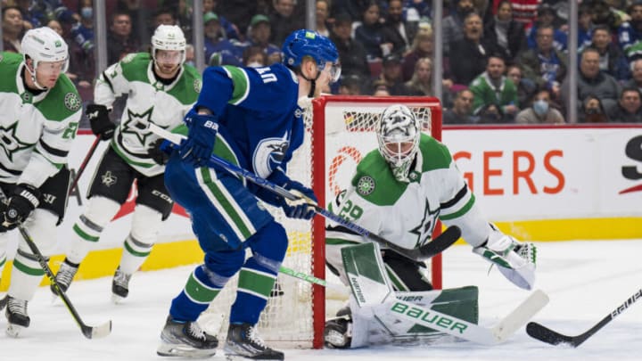 Apr 18, 2022; Vancouver, British Columbia, CAN; Vancouver Canucks forward Elias Pettersson (40) scores on Dallas Stars goalie Jake Oettinger (29) in the first period at Rogers Arena. Mandatory Credit: Bob Frid-USA TODAY Sports