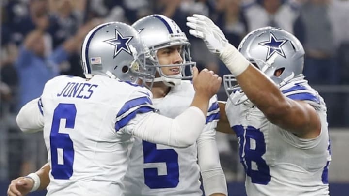 Sep 13, 2015; Arlington, TX, USA; Dallas Cowboys kicker Dan Bailey (5) celebrates with punter Chris Jones (6) and defensive tackle Tyrone Crawford (98) after kicking the game winning extra point against the New York Giants at AT&T Stadium. Dallas won 27-26. Mandatory Credit: Tim Heitman-USA TODAY Sports