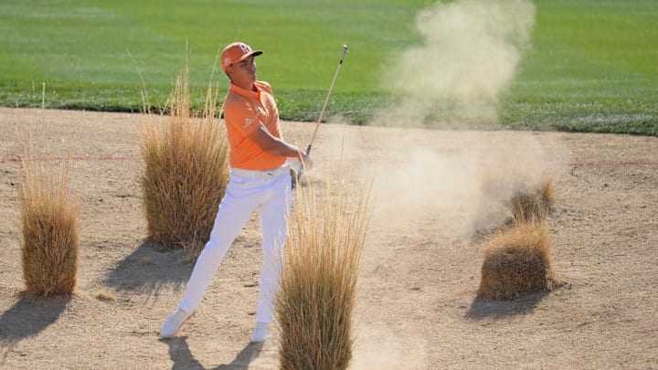 SCOTTSDALE, AZ - FEBRUARY 04: Rickie Fowler hits a shot during the final round of the Waste Management Phoenix Open at TPC Scottsdale on February 4, 2018 in Scottsdale, Arizona. (Photo by Robert Laberge/Getty Images)