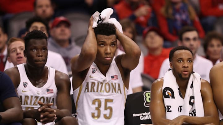 PHOENIX, AZ - DECEMBER 05: Allonzo Trier #35 (C) of the Arizona Wildcats reacts on the bench during the first half of the college basketball game against the Texas A&M Aggies at Talking Stick Resort Arena on December 5, 2017 in Phoenix, Arizona. (Photo by Christian Petersen/Getty Images)
