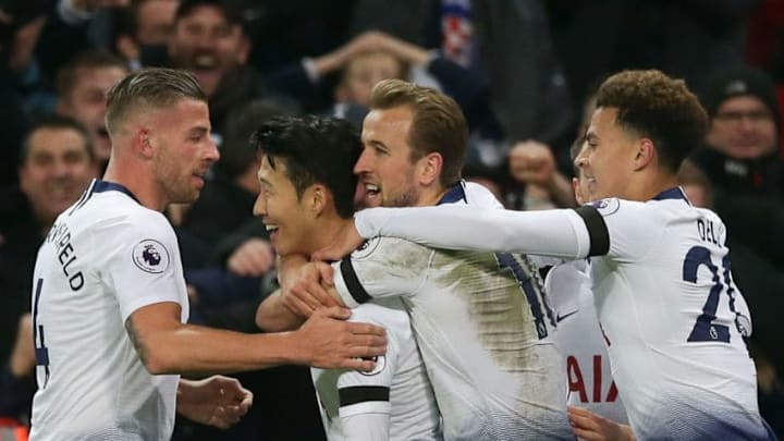 Tottenham Hotspur's South Korean striker Son Heung-Min (2L) celebrates scoring their third goal during the English Premier League football match between Tottenham Hotspur and Chelsea at Wembley Stadium in London, on November 24, 2018. (Photo by Daniel LEAL-OLIVAS / AFP) / RESTRICTED TO EDITORIAL USE. No use with unauthorized audio, video, data, fixture lists, club/league logos or 'live' services. Online in-match use limited to 120 images. An additional 40 images may be used in extra time. No video emulation. Social media in-match use limited to 120 images. An additional 40 images may be used in extra time. No use in betting publications, games or single club/league/player publications. / (Photo credit should read DANIEL LEAL-OLIVAS/AFP/Getty Images)