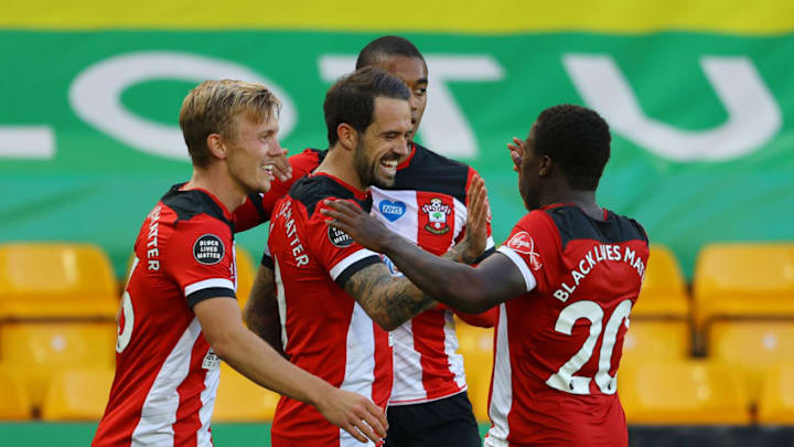 NORWICH, ENGLAND - JUNE 19: Danny Ings of Southampton celebrates with Nathan Redmond, Yan Valery and Michael Obafemi after scoring his team's first goal during the Premier League match between Norwich City and Southampton FC at Carrow Road on June 19, 2020 in Norwich, England. (Photo by Richard Heathcote/Getty Images)