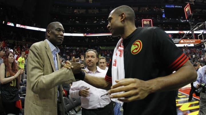 Apr 26, 2016; Atlanta, GA, USA; Atlanta Hawks center Al Horford (15) celebrates a victory with former center Dikembe Mutombo against the Boston Celtics after game five of the first round of the NBA Playoffs at Philips Arena. The Hawks defeated the Celtics 110-83. Mandatory Credit: Brett Davis-USA TODAY Sports