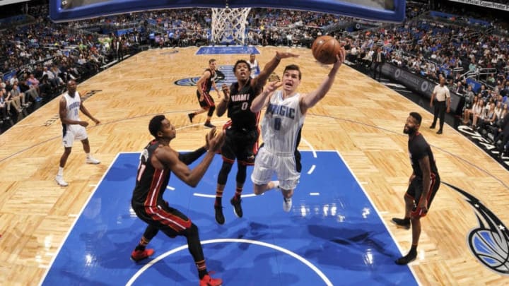 ORLANDO, FL - MARCH 3: Mario Hezonja #8 of the Orlando Magic shoots the ball against the Miami Heat on March 3, 2017 at the Amway Center in Orlando, Florida. NOTE TO USER: User expressly acknowledges and agrees that, by downloading and or using this Photograph, user is consenting to the terms and conditions of the Getty Images License Agreement. Mandatory Copyright Notice: Copyright 2017 NBAE (Photo by Fernando Medina/NBAE via Getty Images)