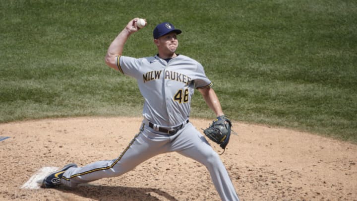 Jul 26, 2020; Chicago, Illinois, USA; Milwaukee Brewers relief pitcher Corey Knebel (46) delivers against the Chicago Cubs during the fourth inning at Wrigley Field. Mandatory Credit: Kamil Krzaczynski-USA TODAY Sports