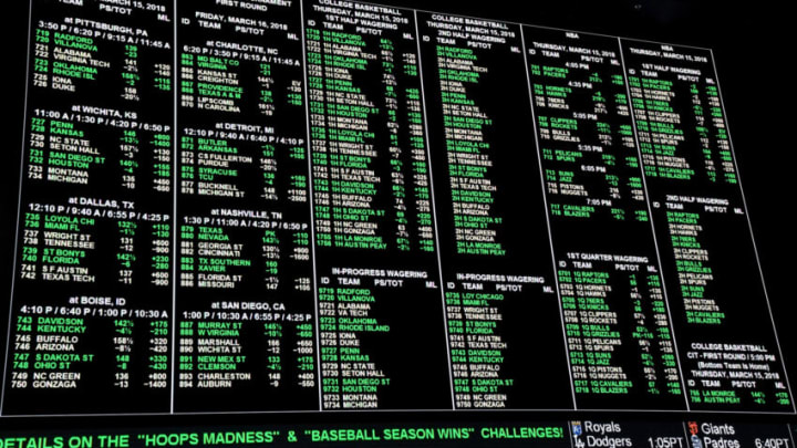 LAS VEGAS, NV - MARCH 15: Betting lines for college basketball games are displayed during a viewing party for the NCAA Men's College Basketball Tournament inside the 25,000-square-foot Race & Sports SuperBook at the Westgate Las Vegas Resort & Casino which features 4,488-square-feet of HD video screens on March 15, 2018 in Las Vegas, Nevada. (Photo by Ethan Miller/Getty Images)