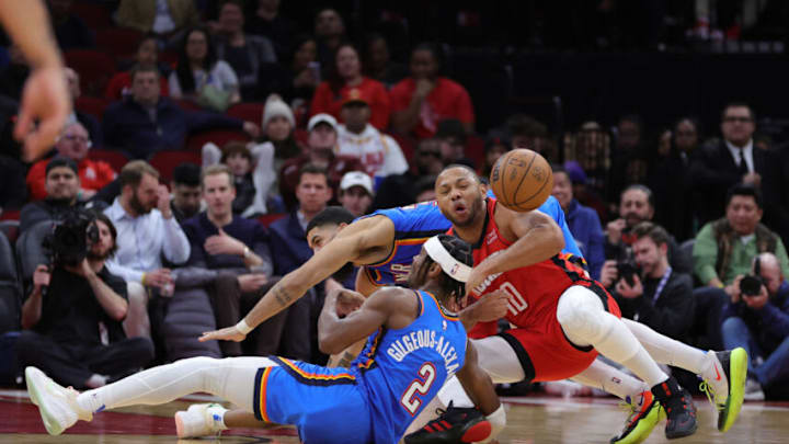 Eric Gordon #10 of the Houston Rockets battles Shai Gilgeous-Alexander #2 of the Oklahoma City Thunder (Photo by Carmen Mandato/Getty Images)