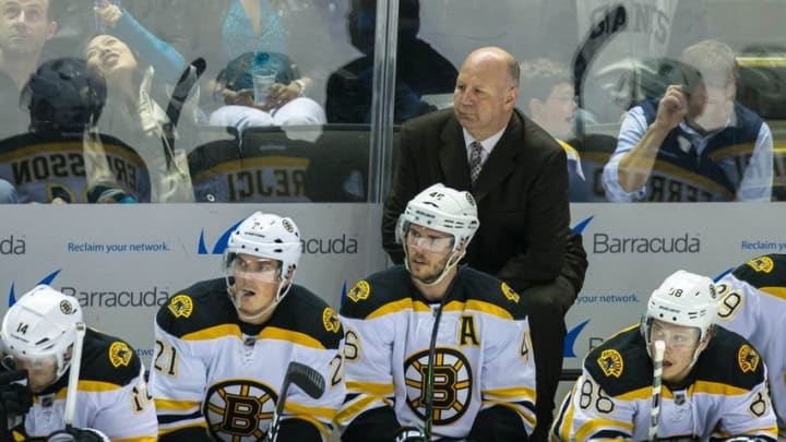 Mar 15, 2016; San Jose, CA, USA; Boston Bruins head coach Claude Julien watches the game against the San Jose Sharks in the first period at SAP Center at San Jose. Mandatory Credit: John Hefti-USA TODAY Sports.
