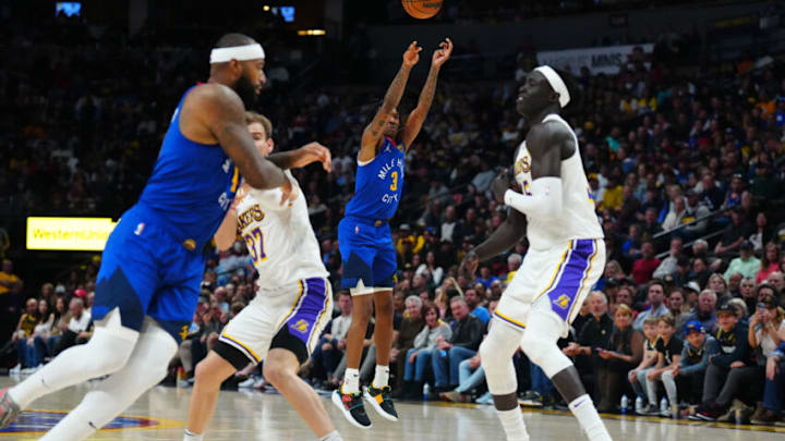 Apr 10, 2022; Denver, Colorado, USA; Denver Nuggets guard Bones Hyland (3) shoots the ball in the second quarter against the Los Angeles Lakers at Ball Arena. Mandatory Credit: Ron Chenoy-USA TODAY Sports