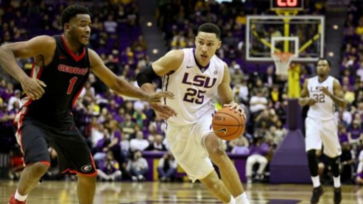 Jan 26, 2016; Baton Rouge, LA, USA; LSU Tigers forward Ben Simmons (25) drives past Georgia Bulldogs forward Yante Maten (1) during the first half of a game at the Pete Maravich Assembly Center. Mandatory Credit: Derick E. Hingle-USA TODAY Sports