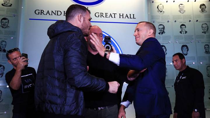 TORONTO, ON - OCTOBER 13: Michael Bisping and Georges St-Pierre face off following the UFC 217 press conference with Dana White at the Hockey Hall of Fame on October 13, 2017 in Toronto, Canada. (Photo by Vaughn Ridley/Zuffa LLC/Zuffa LLC via Getty Images)