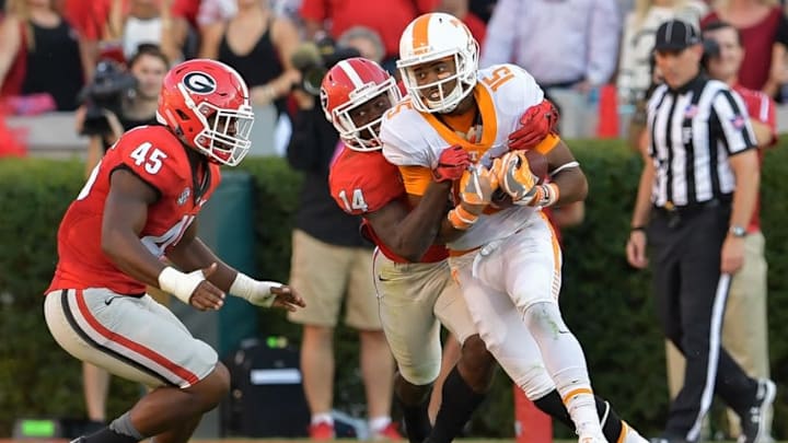 Oct 1, 2016; Athens, GA, USA; Tennessee Volunteers wide receiver Jauan Jennings (15) catches a pass in front of Georgia Bulldogs cornerback Malkom Parrish (14) during the second half at Sanford Stadium. Tennessee defeated Georgia 34-31. Mandatory Credit: Dale Zanine-USA TODAY Sports