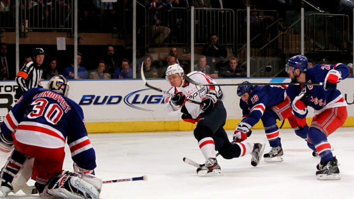 NEW YORK, NY – MAY 07: Alexander Semin #28 of the Washington Capitals takes a shot against Henrik Lundqvist #30 of the New York Rangers in Game Five of the Eastern Conference Semifinals during the 2012 NHL Stanley Cup Playoffs at Madison Square Garden on May 7, 2012 in New York City. (Photo by Bruce Bennett/Getty Images)