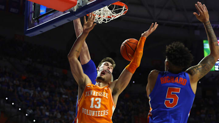 Feb 1, 2023; Gainesville, Florida, USA; Florida Gators guard Will Richard (5) blocks Tennessee Volunteers forward Olivier Nkamhoua (13) shot during the second half at Exactech Arena at the Stephen C. O'Connell Center. Mandatory Credit: Kim Klement-USA TODAY Sports Feb 1, 2023; Gainesville, Florida, USA; Florida Gators guard Will Richard (5) blocks Tennessee Volunteers forward Olivier Nkamhoua (13) shot during the second half at Exactech Arena at the Stephen C. O'Connell Center. Mandatory Credit: Kim Klement-USA TODAY Sports