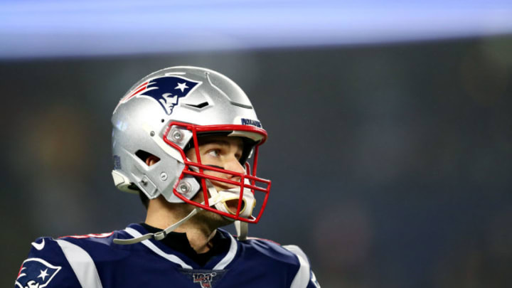 FOXBOROUGH, MASSACHUSETTS - JANUARY 04: Tom Brady #12 of the New England Patriots looks on in the AFC Wild Card Playoff game against the Tennessee Titans at Gillette Stadium on January 04, 2020 in Foxborough, Massachusetts. (Photo by Adam Glanzman/Getty Images)