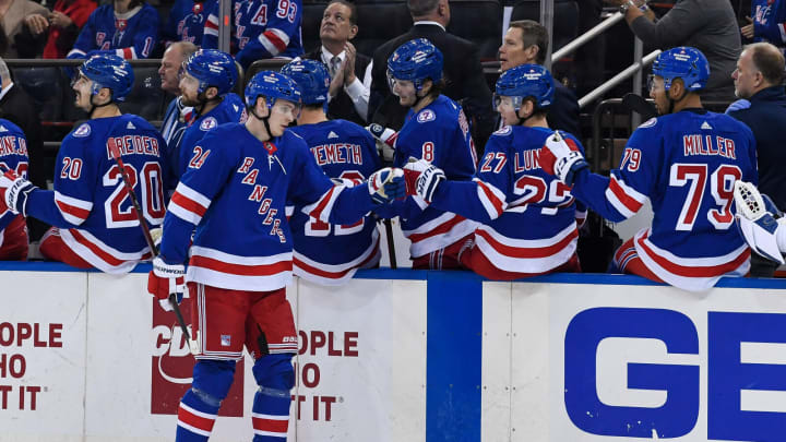 Nov 16, 2021; New York, New York, USA; New York Rangers right wing Kaapo Kakko (24) celebrates with teammates after scoring a goal against the Montreal Canadiens during the first period at Madison Square Garden. Mandatory Credit: Dennis Schneidler-USA TODAY Sports