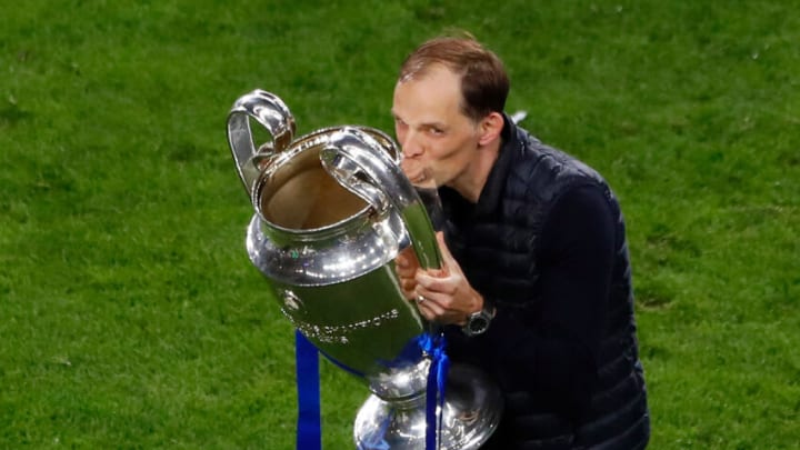 TOPSHOT - Chelsea's German coach Thomas Tuchel celebrates with the trophy after winning the UEFA Champions League final football match at the Dragao stadium in Porto on May 29, 2021. (Photo by SUSANA VERA / POOL / AFP) (Photo by SUSANA VERA/POOL/AFP via Getty Images)