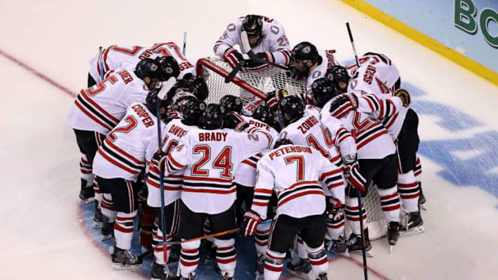 BOSTON, MA - APRIL 09: The Nebraska-Omaha Mavericks huddle around their goal before their game against the Providence Friars during the 2015 NCAA Division I Men's Hockey Championship semifinals at TD Garden on April 9, 2015 in Boston, Massachusetts. (Photo by Mike Lawrie/Getty Images)