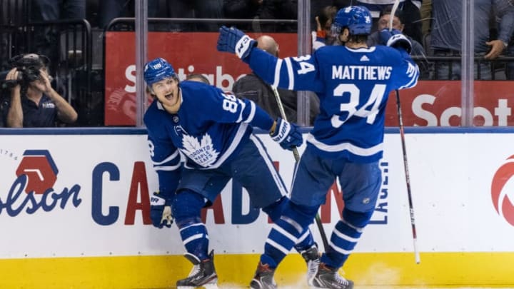 TORONTO, ON - OCTOBER 7: William Nylander #88 of the Toronto Maple Leafs celebrates his gaol against the St. Louis Blues with teammate Auston Matthews #34 during the second period at the Scotiabank Arena on October 7, 2019 in Toronto, Ontario, Canada. (Photo by Kevin Sousa/NHLI via Getty Images)