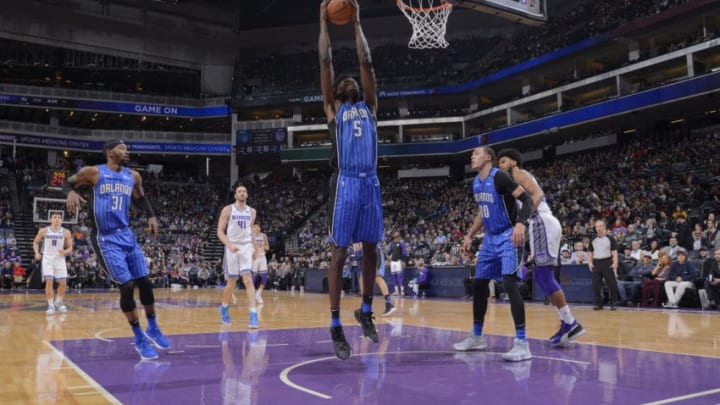 SACRAMENTO, CA - JANUARY 7: Mo Bamba #5 of the Orlando Magic rebounds against the Sacramento Kings on January 7, 2019 at Golden 1 Center in Sacramento, California. NOTE TO USER: User expressly acknowledges and agrees that, by downloading and or using this photograph, User is consenting to the terms and conditions of the Getty Images Agreement. Mandatory Copyright Notice: Copyright 2019 NBAE (Photo by Rocky Widner/NBAE via Getty Images)