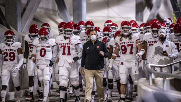 COLUMBUS, OH - NOVEMBER 7: Head coach Greg Schiano of the Rutgers Scarlet Knights leads the team onto the field ahead of a regular season game against the Ohio State Buckeyes on November 7, 2020 in Columbus, Ohio. (Photo by Benjamin Solomon/Getty Images)