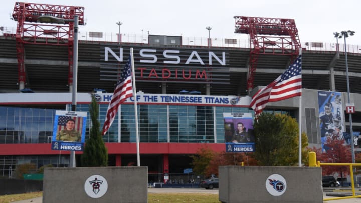 Nov 14, 2021; Nashville, Tennessee, USA; View of flags and signs of military service personnel outside Nissan Stadium as a part of salute to service week before the game between the Tennessee Titans and the New Orleans Saints. Mandatory Credit: Christopher Hanewinckel-USA TODAY Sports