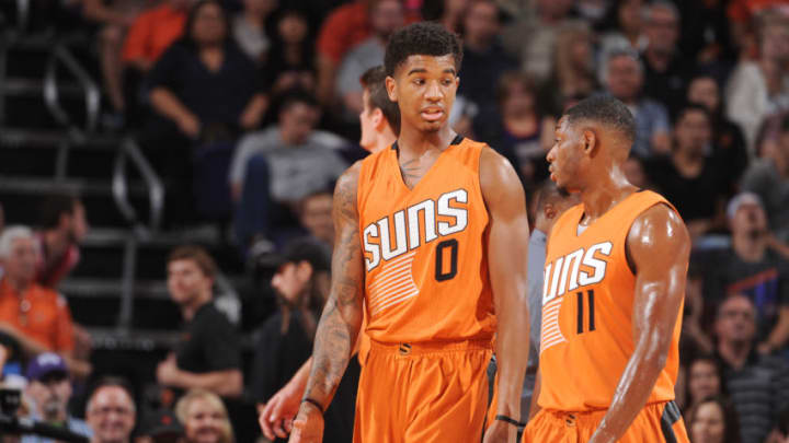 PHOENIX, AZ - OCTOBER 30: Marquese Chriss #0 and Brandon Knight #11 of the Phoenix Suns talk things over during the game against the Golden State Warriors on October 30, 2016 at Talking Stick Resort Arena in Phoenix, Arizona. NOTE TO USER: User expressly acknowledges and agrees that, by downloading and or using this photograph, user is consenting to the terms and conditions of Getty Images License Agreement. Mandatory Copyright Notice: Copyright 2016 NBAE (Photo by Noah Graham/NBAE via Getty Images)