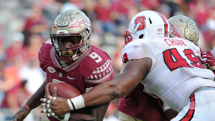 Nov 14, 2015; Tallahassee, FL, USA; Florida State Seminoles running back Jacques Patrick (9) runs the ball past North Carolina State Wolfpack defensive end Bradley Chubb (49) during the second half of the game at Doak Campbell Stadium. Mandatory Credit: Melina Vastola-USA TODAY Sports