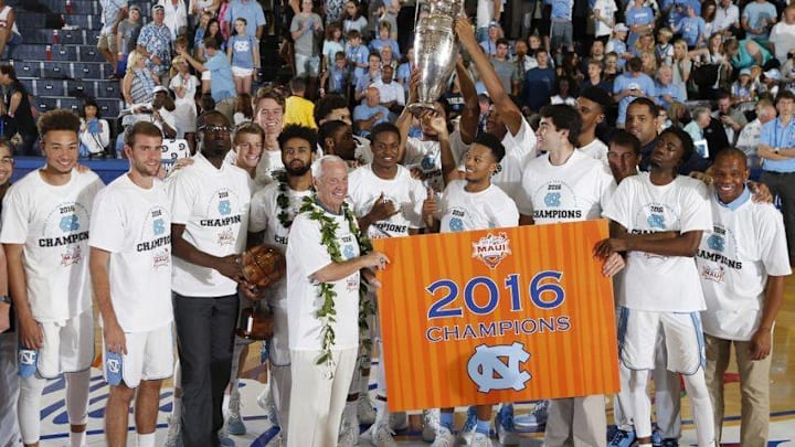 Nov 23, 2016; Lahaina, Maui, HI, USA; North Carolina Tar Heels celebrate with the Wayne Duke Championship Trophy after defeating the Wisconsin Badgers in the Championship Game of the Maui Jim Maui Invitational at the Lahaina Civic Center. Mandatory Credit: Brian Spurlock-USA TODAY Sports