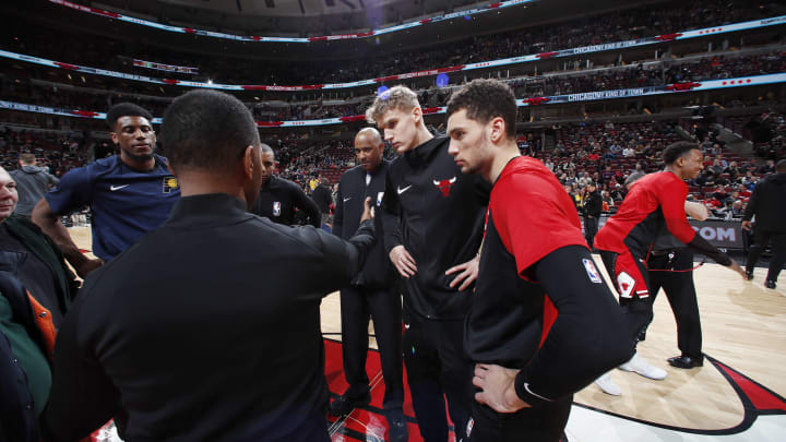 CHICAGO, IL – JANUARY 4: Thaddeus Young #21 of the Indiana Pacers, Lauri Markkanen #24 of the Chicago Bulls, and Zach LaVine #8 of the Chicago Bulls stand for the captain’s huddle prior to the game on January 4, 2019 at United Center in Chicago, Illinois. NOTE TO USER: User expressly acknowledges and agrees that, by downloading and or using this photograph, User is consenting to the terms and conditions of the Getty Images License Agreement. Mandatory Copyright Notice: Copyright 2019 NBAE (Photo by Jeff Haynes/NBAE via Getty Images)