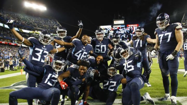 NASHVILLE, TN - DECEMBER 6: Derrick Henry #22 of the Tennessee Titans celebrates a touchdown with his teammates during the fourth quarter against the Jacksonville Jaguars at Nissan Stadium on December 6, 2018 in Nashville, Tennessee. (Photo by Frederick Breedon/Getty Images)