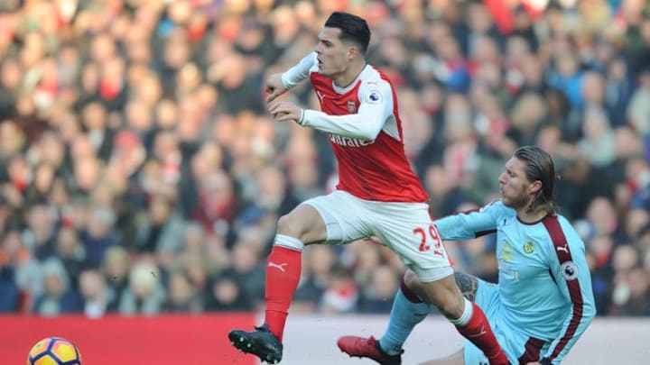 LONDON, ENGLAND - JANUARY 22: Granit Xhaka of Arsenal challneged by Jeff Hendrick of Burnley during the Premier League match between Arsenal and Burnley at Emirates Stadium on January 22, 2017 in London, England. (Photo by Stuart MacFarlane/Arsenal FC via Getty Images)