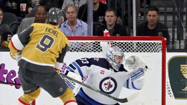 LAS VEGAS, NEVADA - OCTOBER 20: Jack Eichel #9 of the Vegas Golden Knights scores the first of his two first-period goals against David Rittich #33 of the Winnipeg Jets during their game at T-Mobile Arena on October 20, 2022 in Las Vegas, Nevada. (Photo by Ethan Miller/Getty Images)