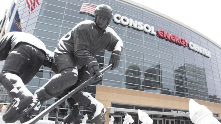 Jan 23, 2016; Pittsburgh, PA, USA; General view of snow on the Mario Lemieux statue outside before the Pittsburgh Penguins host the Vancouver Canucks at the CONSOL Energy Center. Mandatory Credit: Charles LeClaire-USA TODAY Sports