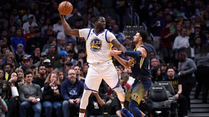 DENVER, CO - FEBRUARY 03: Draymond Green #23 of the Golden State Warriors posts up Jamal Murray #27 of the Denver Nuggets at Pepsi Center on February 3, 2018 in Denver, Colorado. NOTE TO USER: User expressly acknowledges and agrees that, by downloading and or using this photograph, User is consenting to the terms and conditions of the Getty Images License Agreement. (Photo by Jamie Schwaberow/Getty Images)
