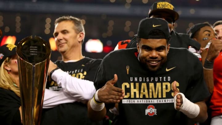 ARLINGTON, TX - JANUARY 12: Running back Ezekiel Elliott #15 of the Ohio State Buckeyes celebrates with the trophy after defeating the Oregon Ducks 42 to 20 in the College Football Playoff National Championship Game at AT&T Stadium on January 12, 2015 in Arlington, Texas. (Photo by Ronald Martinez/Getty Images)