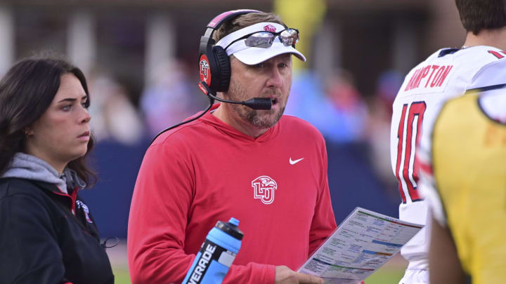 Nov 6, 2021; Oxford, Mississippi, USA; Liberty Flames head coach Hugh Freeze walks down the sideline during the first quarter against the Mississippi Rebels at Vaught-Hemingway Stadium. Mandatory Credit: Matt Bush-USA TODAY Sports