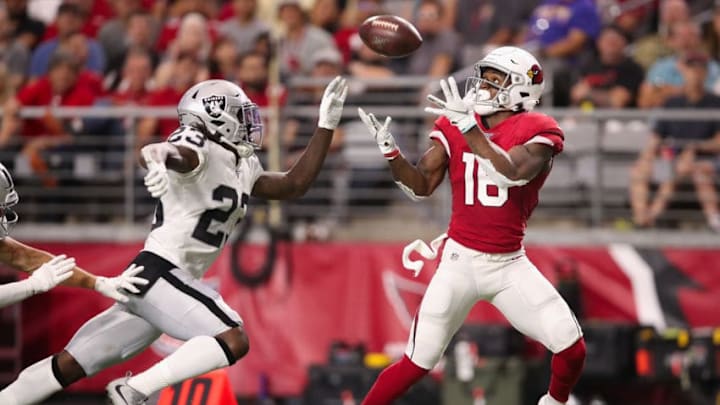 GLENDALE, ARIZONA - AUGUST 15: Wide receiver Trent Sherfield #16 of the Arizona Cardinals catches a 40 yard touchdown reception ahead of cornerback Nick Nelson #23 of the Oakland Raiders during the first half of the NFL preseason game at State Farm Stadium on August 15, 2019 in Glendale, Arizona. (Photo by Christian Petersen/Getty Images)